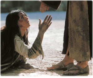 Jesus extends his hand to the Adulterous Woman