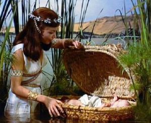 Pharaoh's daughter finds the baby Moses hidden in the bulrushes