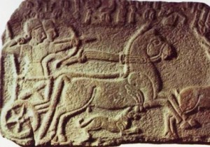 Ancient wall relief. The battle chariots of Ahab were similar, carrying an archer and a driver