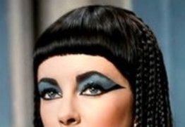 Elaborate eye make-up and wig worn by Queen Cleopatra in the movie 'Cleopatra'