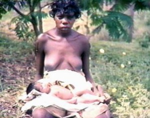 Aboriginal woman with her sleeping child
