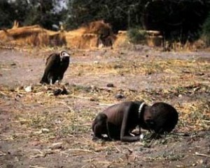 Vulture waiting for a dying child during a terrible drought