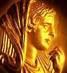 Golden profile of a woman from ancient times