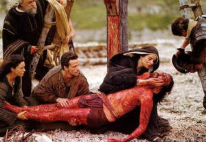 Mary of Nazareth, mother of Jesus, holds her dead son after the crucifixion; from the film The Passion of the Christ