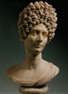 Marble bust of a Roman woman with elaborate hairstyle