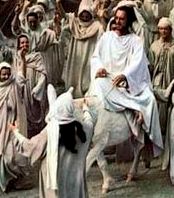 Jesus of Nazareth rides a white donkey into Jerusalem in 'The Greatest Story Ever Told'