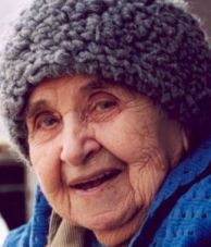 Old woman in a knitted hat