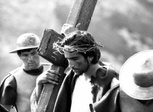 Christ carrying his cross in Pasolini's 'Gospel According to St Matthew'