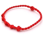Knotted red thread for the wrist