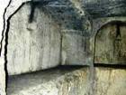 Ancient tomb with hollowed out shelf on which the body was laid