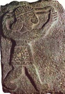 Ancient stone carving of a soldier wielding a slingshot; it was a common weapon in ancient Israel