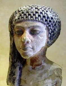 Statue of Queen Merit, discovered at Amarna. This shape of face was much admired at the time.