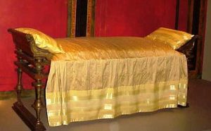 Reconstruction of an ancient, richly decorated bed