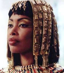 African woman in jewelled headdress