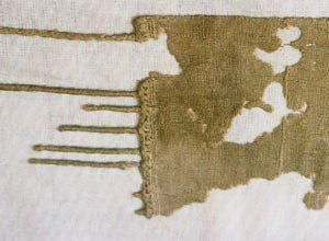 Fragment of a fringed linen garment from Tel El Amarna, circa 1,350 BC