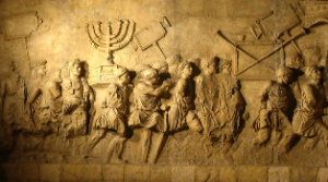 The Arch of Titus, showing victorious Roman troops carrying the Jerusalem menorah in triumphal procession