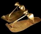 Facsimiles of gold leaf covered sandals, leather, from ancient Egypt; only for the very rich