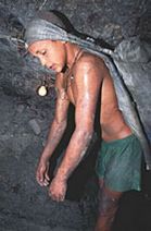 Young boy working in a mine