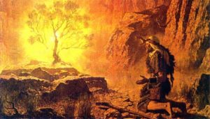 Man kneeling before a burning bush, as described in the Bible