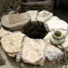 Stone well with cover and jar