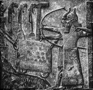 Assyrian wall relief, showing impaled captives (upper left)