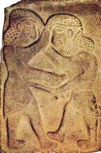 One of the wall reliefs from the site of the Hittite city now called Tel Halaf. This relief was carved in about 6,000 BC. It shows two warriors struggling to stab each other. Their long hair is secured in hair-nets.